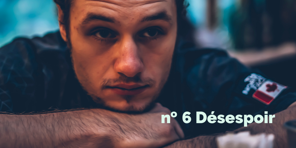 no 6 Désespoir. Un homme posant la tête sur ses mains.