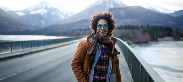 man in front of mountain