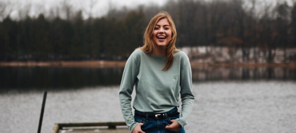 girl smiling on deck