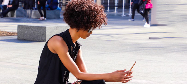 woman_outside_phone-670x200